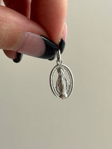 the Virgin Mary medai top