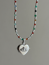 Hands wrapped around a heart Design Locket Pendant top