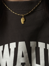 the Virgin Mary charm