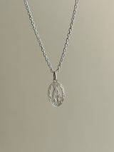 the Virgin Mary medai top