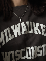 the Virgin Mary charm