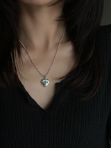 Hands wrapped around a heart Design Locket Pendant top