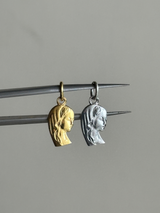 the Virgin Mary charm