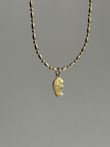 the Virgin Mary charm