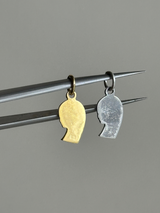 the Virgin Mary charm