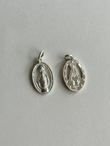 the Virgin Mary medai top