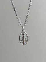 the Virgin Mary medai top