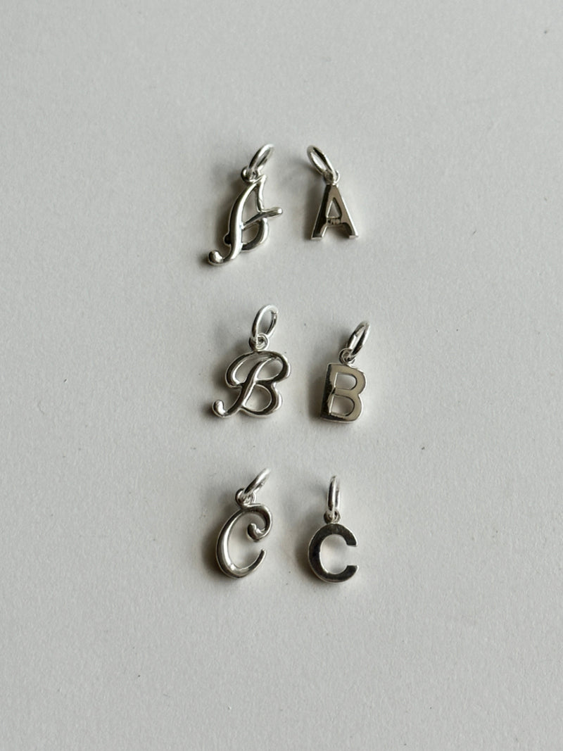 antique alphabet charm